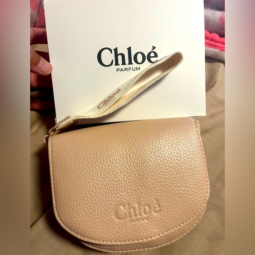 3/$25• Chloé Small Cream wristlet